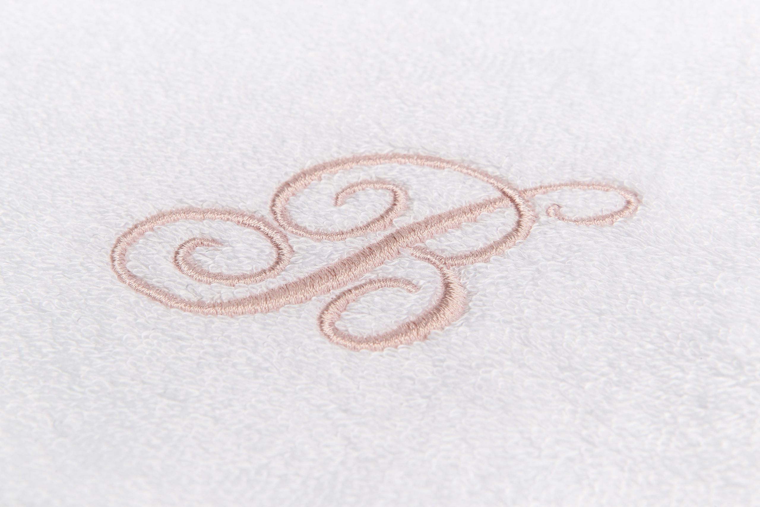 Monogramma Beltrami Baby ricamato su tessuto in Fibra di Legno