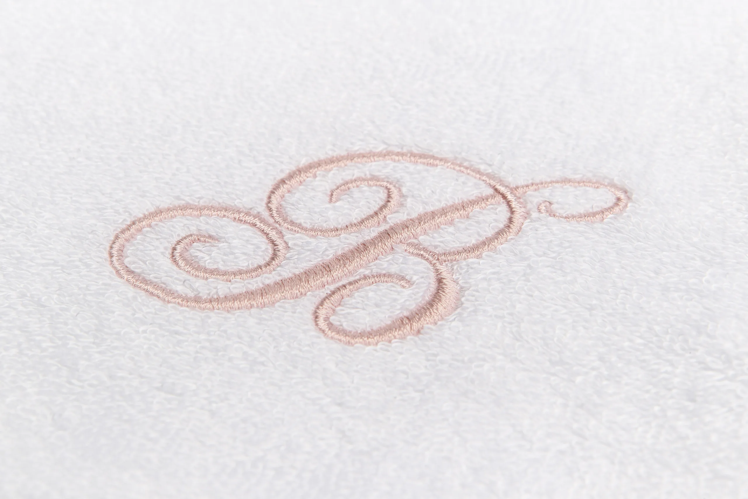 Monogramma Beltrami Baby ricamato su tessuto in Fibra di Legno